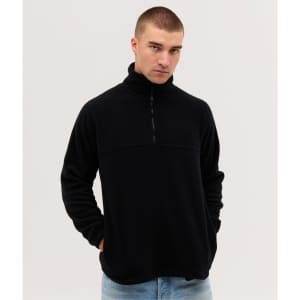 A black polar fleece 1/4 zip shirt with a high collar and a zippered front, featuring a logo.