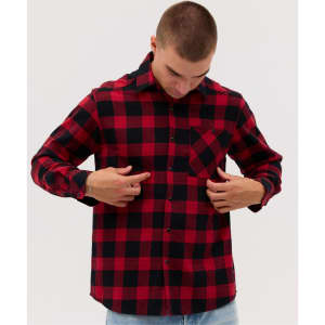 A flannel long sleeve shirt in red and black check pattern, featuring a front pocket and button closures.