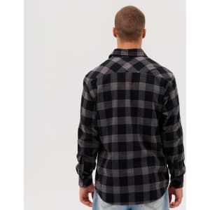 A black and grey checked flannel long sleeve shirt, viewed from the back, featuring a logo.