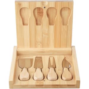 A bamboo cheese board set featuring a hinged lid and five cheese utensils. The wood has a natural finish.