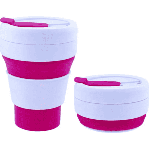 A collapsible silicone cup in white and pink, shown in both expanded and collapsed forms. Features a lid and logo.