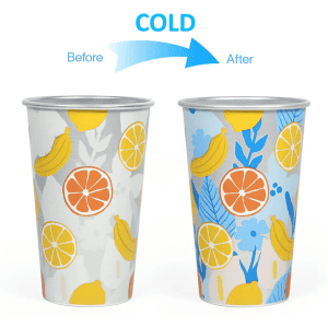 A drink cup featuring a colour-changing design with fruits and flowers in bright colours. The cup has a logo.