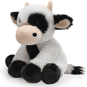 A plush toy cow in white and black, featuring large ears, a round face, and soft fabric for cuddling.