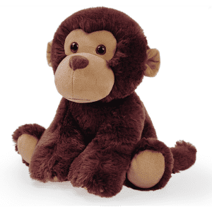 A plush toy of a brown monkey with soft fur and large eyes, sitting with its hands on its knees.