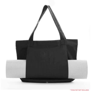 A black canvas bag with a yoga mat rolled up and secured on the side. The bag features two handles and a logo.