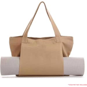 A tan canvas bag with a yoga mat rolled up and secured inside. The bag has two handles and a logo.