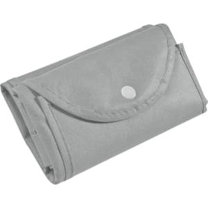 A grey foldable non-woven shopping bag, secured with a snap button, neatly folded for compact storage.