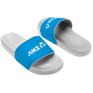 Blue slide sandals featuring a white logo on a blue strap and a grey sole.