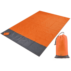An orange and grey polyester picnic blanket laid out flat beside a matching pouch.