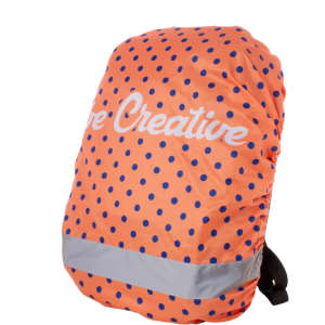 An orange backpack cover with navy polka dots and a reflective strip, featuring a logo.