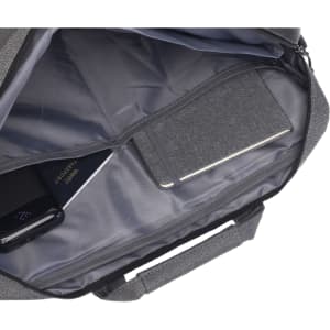 A grey laptop bag interior featuring a phone, passport, and notebook in separate compartments.