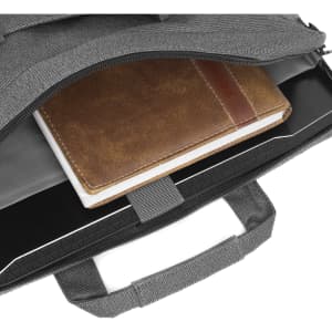 A grey laptop bag with a brown notebook inside, featuring a sleek, modern design and a logo.