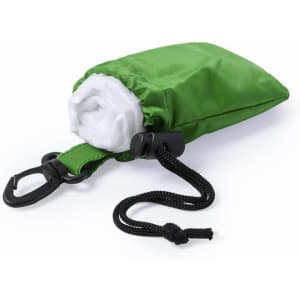 A green pouch containing a folded white poncho, with a black clip and drawstring for secure closure.