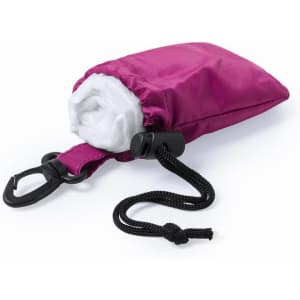 A compact magenta poncho packed neatly in a pouch with a clip and drawstring for easy storage.