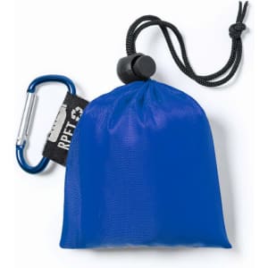 A blue poncho packed in a compact pouch, featuring a carabiner for attachment and a logo.