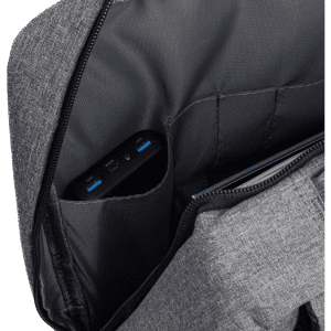 A grey slate backpack featuring an inner pocket with a device and USB ports visible.