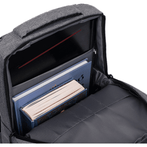 A grey backpack’s interior displays books and a laptop compartment, featuring a sleek design and ample storage space.