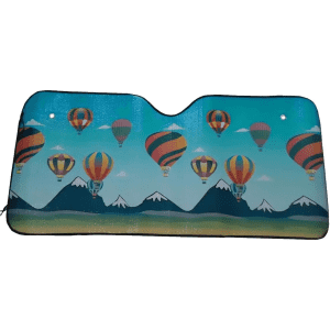 A foldable car sunshade featuring a vibrant design of colourful hot air balloons against a mountainous landscape.