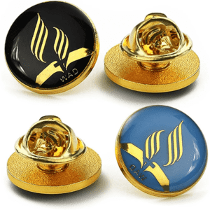 Custom enamel lapel pins in black and blue, featuring a gold base with a decorative logo design.