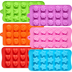 A collection of silicone ice trays in various colours, featuring custom moulds in shapes like flowers, hearts, and stars.