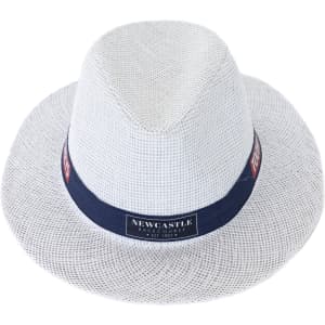 A white straw hat with a navy band and logo, featuring a classic fedora shape.