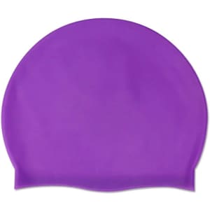 A purple silicone swimming cap featuring a smooth texture and a rounded design. It has a logo on its surface.