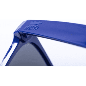 Blue sunglasses with dark lenses, featuring a logo on the temple and a smooth finish.