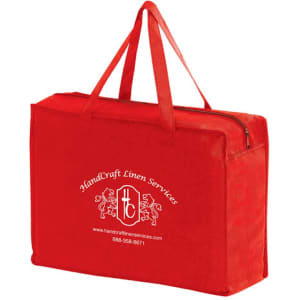A red non-woven tote bag features a zippered closure and sturdy handles, with a logo on the front.