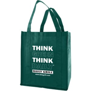 A large green reusable grocery bag with sturdy handles and a logo.