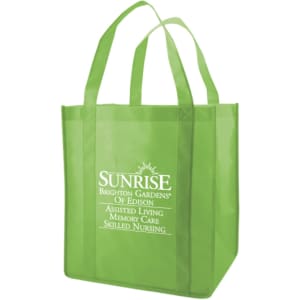 A bright green extra-large non-woven shopping bag with two handles and a logo on one side.
