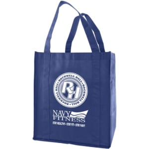 A large navy blue non-woven reusable grocery bag with two handles and a logo.