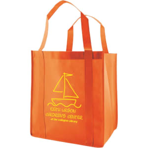 An extra-large, orange non-woven shopping bag with two handles and a logo featuring a sailboat design.