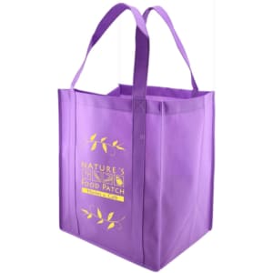 A purple extra large non-woven reusable shopping bag with handles and a logo on the front.