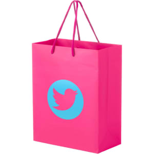 A pink laminated bag with handles and a circular logo featuring a bird design.