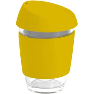 A reusable glass coffee cup in bright yellow with a silicon lid and band, featuring a transparent body.