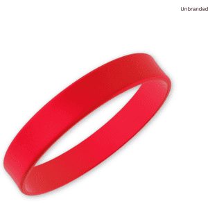 A red silicone wristband with a smooth finish and an unbranded design.