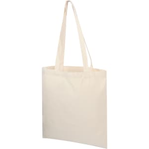 A plain cream canvas tote bag with long handles and no visible branding.
