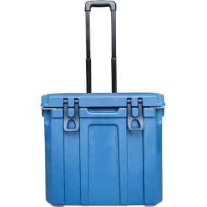 A blue cooler box with wheels and a retractable handle, featuring a sturdy design and an attached logo.
