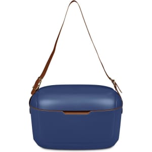 A blue cooler box with a brown adjustable strap, featuring a sleek design and a logo on the front.