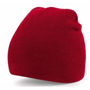 A red acrylic beanie hat with a snug fit, featuring a simple design and textured ribbed pattern.