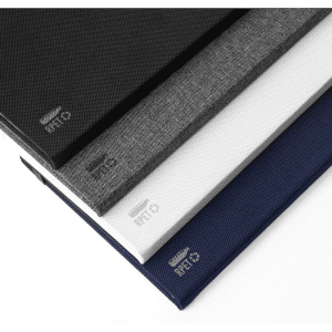 A set of three RPET notebooks in black, grey, and navy, featuring textured covers and a logo.