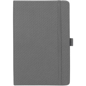 A5 carbon notebook in grey with a textured cover and elastic closure. Features a logo on the front.
