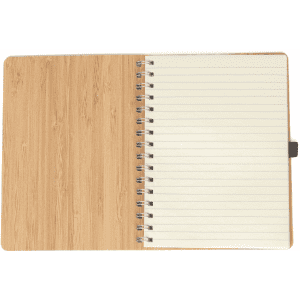 A bamboo notebook featuring a spiral binding and lined pages, showcasing a natural wood finish.