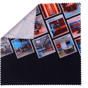 A small microfibre cleaning cloth featuring a colourful design with images and a black border. It has a logo.