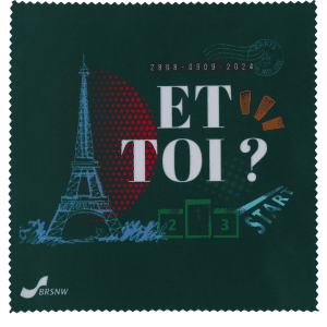 A small green microfibre cleaning cloth featuring the Eiffel Tower and colourful designs, with a logo in the corner.