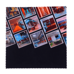 A small black microfibre cleaning cloth featuring various images of indoor spaces.