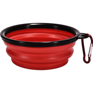 A red silicone collapsible pet bowl with a black rim and a carabiner attachment. Features a logo on the side.