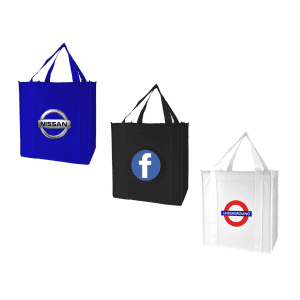 Three tote bags in blue, black, and white, each featuring a different logo on the front.