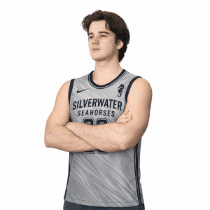 A sports jersey in grey with a subtle pattern and a logo, featuring black trim and a player's number on the front.