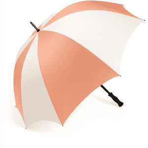 A golf umbrella with a peach and white striped canopy and a black handle, featuring a logo on the side.
